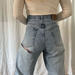 Vintage Calvin Klein light indigo straight leg jeans bum rip super soft & faded